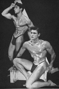 two vintage bodybuilders posing together