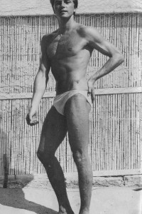 vintage muscle model posing outside