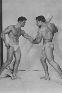 two bodybuilder posing together