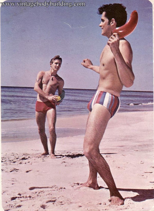 Guys playing on the beach