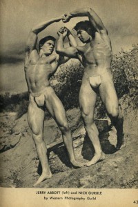 two bodybuuilders posing outdoors