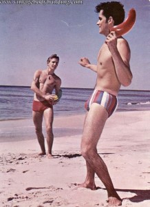 Guys playing on the beach